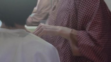 Man putting on makeup