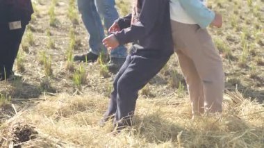 Boys playing butt wrestling