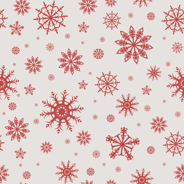 Vánoční bezešvé vzor s červenými sněhové vločky na šedém pozadí. — Stockový vektor
