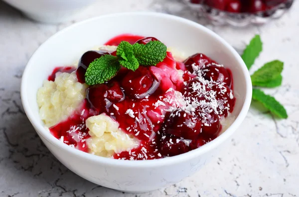 Rice Pudding with Cherry Sauce — Stock Photo, Image