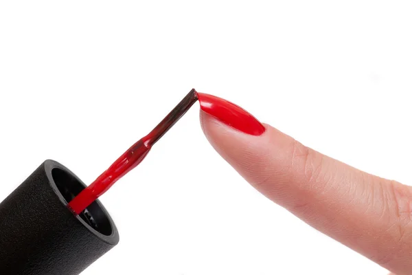 Hermosa uñas de mujer cuidado con esmalte de uñas rojo —  Fotos de Stock