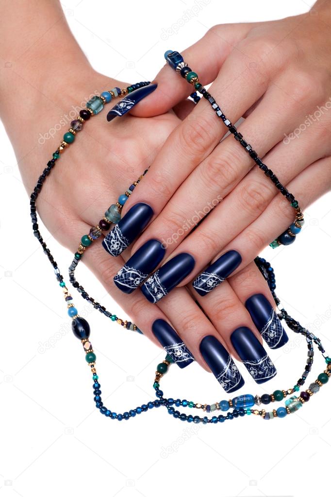 beautiful women hands with blue manicure