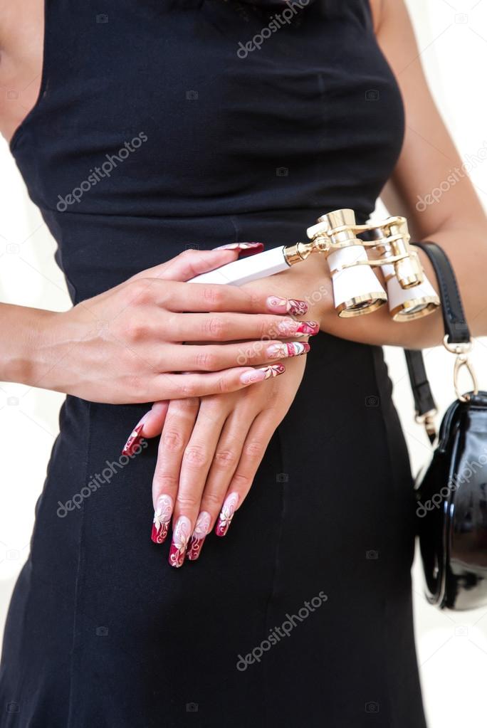 female hands with nice art manicure