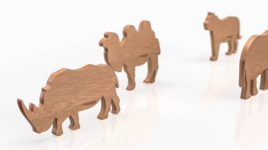 Beyaz bir arkaplana yerleştirilmiş soyut ahşap hayvan figürleri, vahşi yaşam çeşitliliğini, sürdürülebilirliği ve iş, eğitim veya çevre temaları için uygun minimalist tasarım kavramlarını sembolize etmektedir..