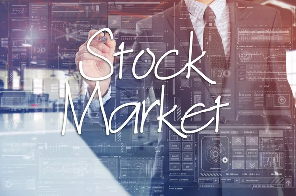 Podnikatel je psaní na průhledné desky, chystá se na prezentaci o: akciový trh — Stock fotografie