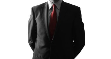 Anonymous businessman standing isolated on white background
