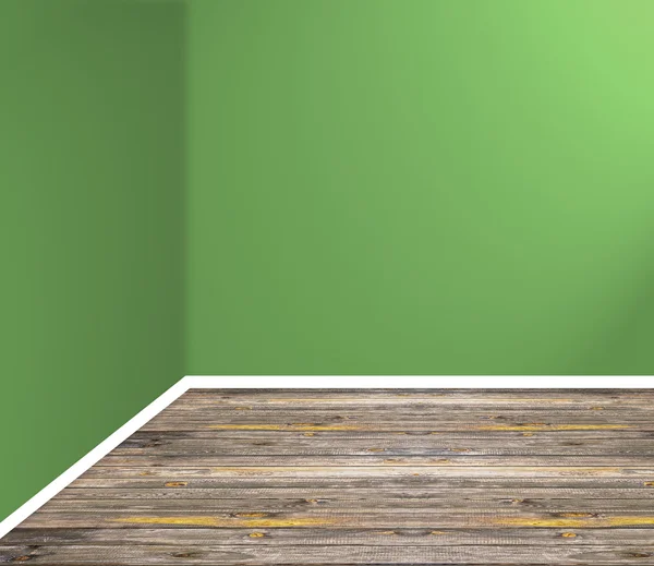 Esquina de la habitación vacía con suelo de madera y pared verde — Foto de Stock