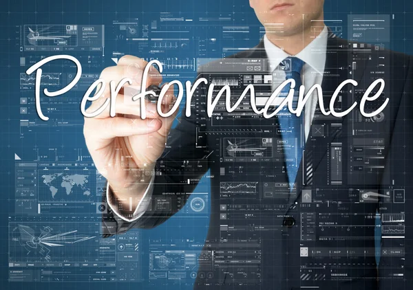 The businessman is writing Performance on the transparent board with some diagrams — Stock Photo, Image