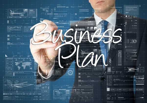 The businessman is writing Business Plan on the transparent boar with some diagrams — Stock Photo, Image