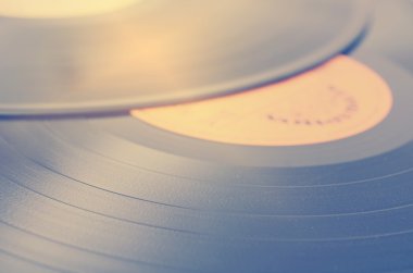 Vinil kaydı oluklar, retro görünüm dokusuna gösterilen etiket ile segment 