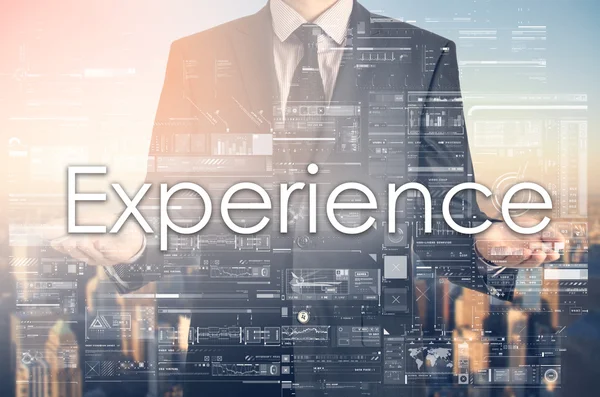 Empresario presenta texto: Experiencia — Foto de Stock