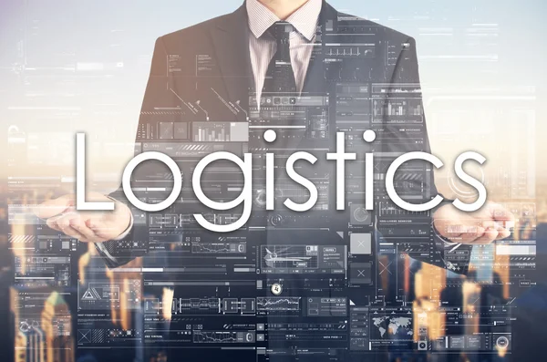 Affärsman presenterar text: logistik — Stockfoto