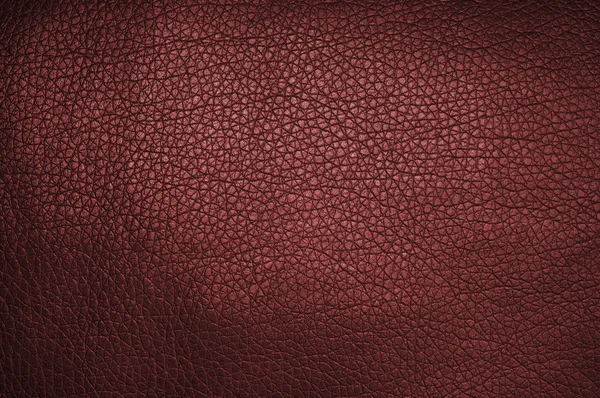 Nahaufnahme aus rotem Leder, nützlich als Hintergrund — Stockfoto
