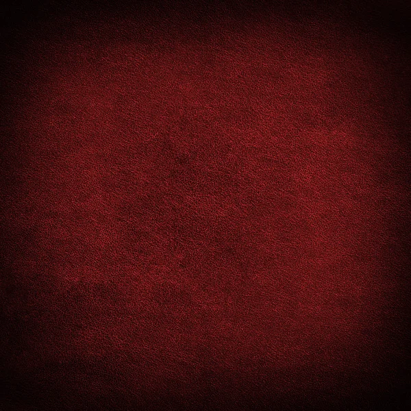 Rött läder textur närbild, användbara som bakgrund — Stockfoto