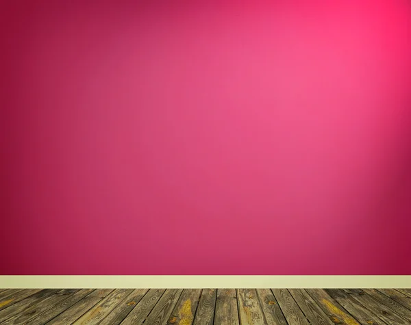 Innenraum mit pinkfarbener Wand und Holzboden — Stockfoto