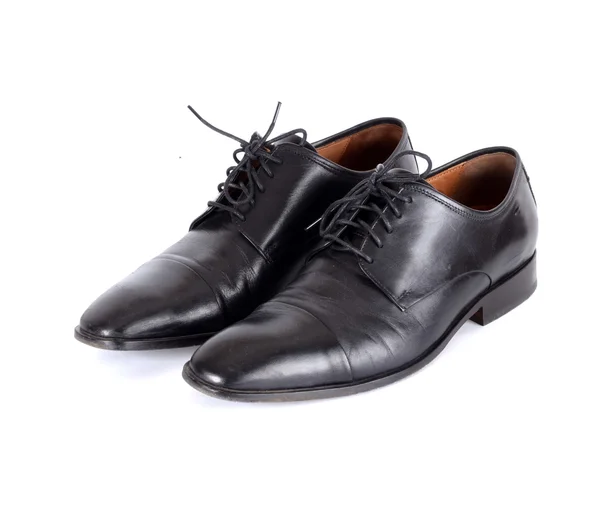 Die schwarzen Schuhe isoliert auf weißem Hintergrund. — Stockfoto