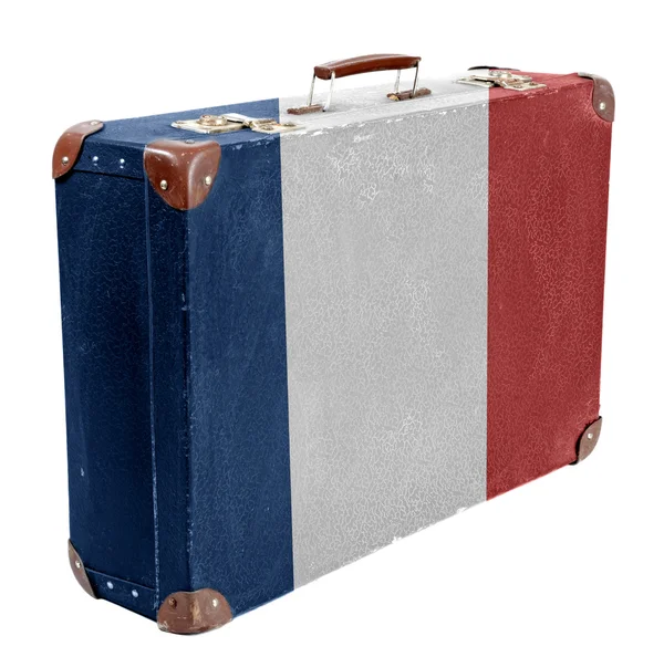 A bandeira francesa pintada na velha mala de viagem grungy ou tronco — Fotografia de Stock