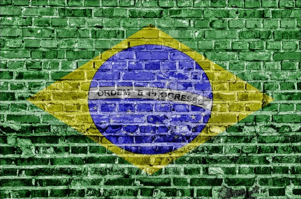 Brezilya bayrağı görüntüsünü bir tuğla duvara boyalı — Stok fotoğraf