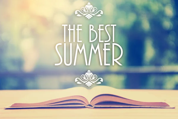 Epigraph over the opened book with elegant ornament - The best summer — Stok Foto