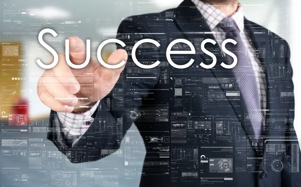 De zakenman is succes kiezen uit scherm van de aanraking — Stockfoto