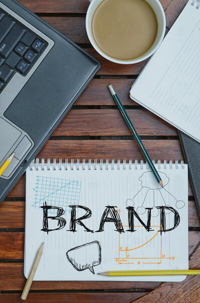 рабочее место с записной книжкой с пометкой о:
 