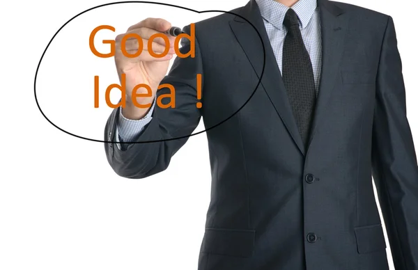 Young businessman writing Good Idea ! — Stockfoto