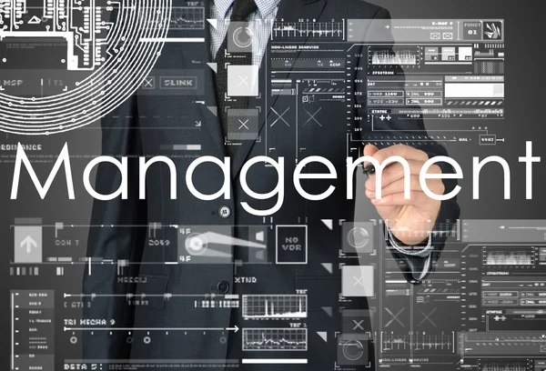 Affärsman skriva Management och rita grafer och diagram — Stockfoto