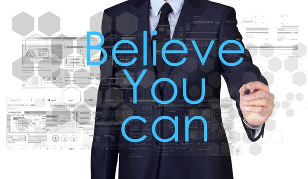 Empresario bosquejando y escribiendo Believe You Can, concepto de motivación —  Fotos de Stock