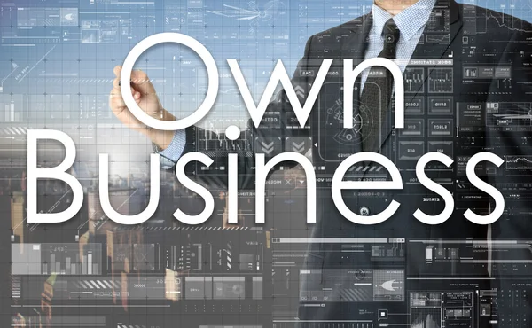 L'homme d'affaires écrit Own Business sur le conseil transparent — Photo