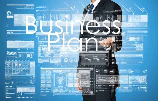Biznesmen prezentuje biznes tekst ze strony: Biznes Plan — Zdjęcie stockowe