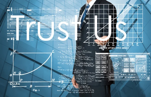 Businessman presenting Trust Us text and graphs and diagrams with city in background — Stock Photo, Image