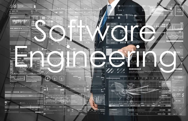 Geschäftsmann präsentiert Software Engineering Text und Grafiken — Stockfoto