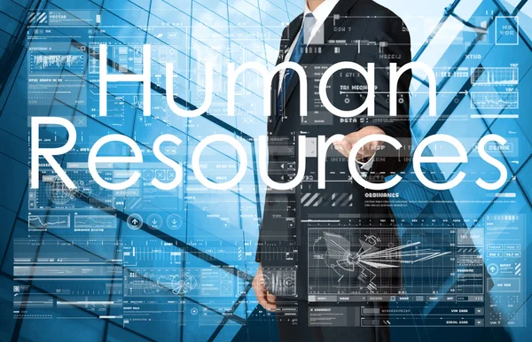 Affärsman presenterar mänskliga resurser text, grafer och diagram — Stockfoto