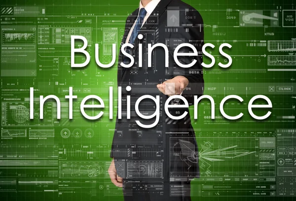 El empresario está presentando el texto del negocio con la mano: Business Intelligence — Foto de Stock