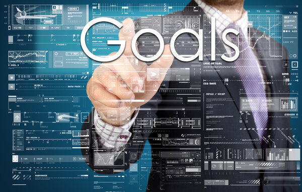 the businessman is pressing the button on the touch screen: Goals