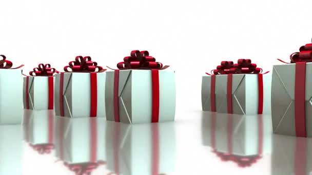 Beyaz arka planda 3D dönen hediye kutuları — Stok video