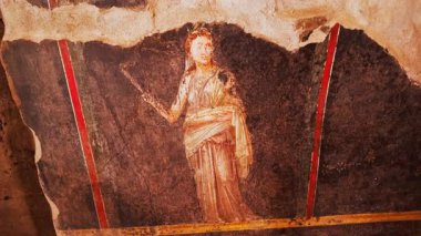 POMPEII (Pompei), İtalya, 20 APRIL 2024 - Vettii Hanedanı 'nda (Casa dei Vettii), Pompeii, Napoli, İtalya, M.S. 79 yılında Vesuvius tarafından gömülmüş bir rahibenin Fresco' su
