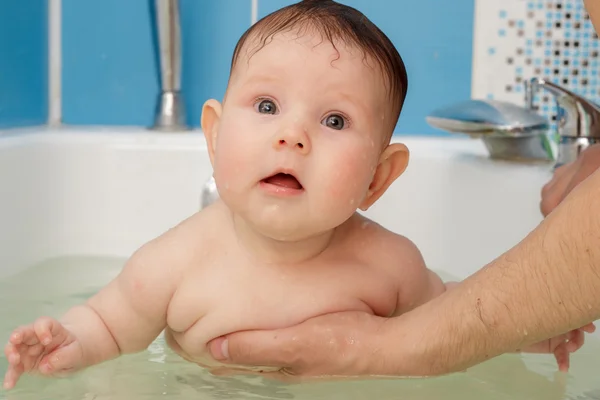 Newborn baby bathe and swim Royalty Free Stock Images