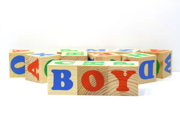 Trä kuber med inskription pojke — Stockfoto