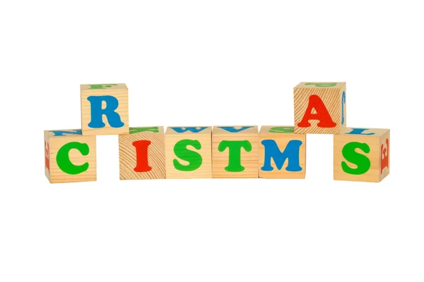 Wood cube with inscription CRISTMAS — Stock Photo, Image