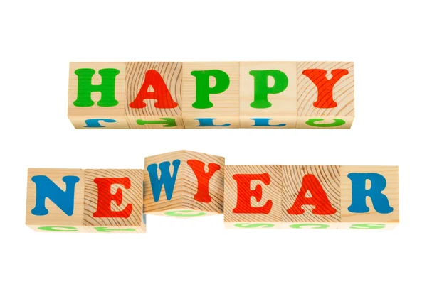 Wood cube with inscription HAPPY NEW YEAR — Stock Photo, Image