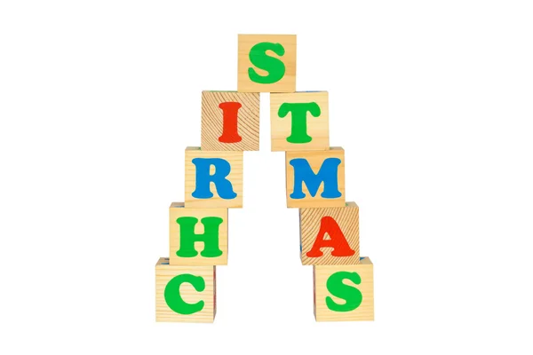 Wood cube with inscription CHRISTMAS — Stock Photo, Image