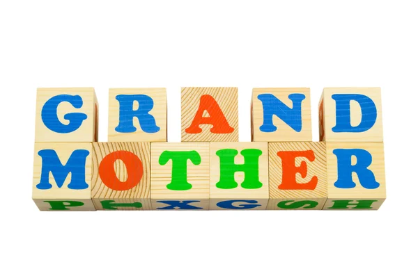 Wood cube with inscription GRANDMOTHER — Stock Photo, Image