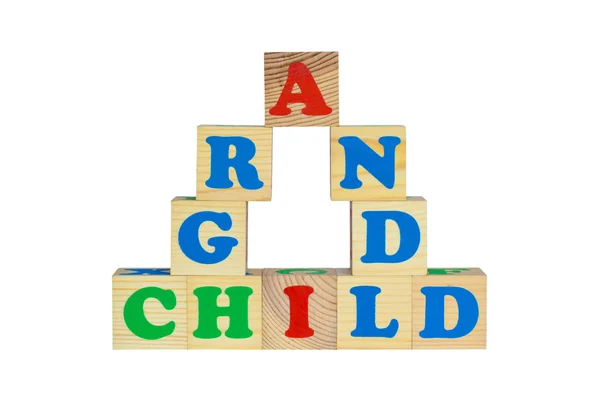 Wood cube with inscription GRANDCHILD — Stock Photo, Image