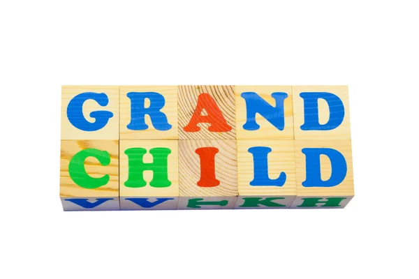 Wood cube with inscription GRANDCHILD — Stock Photo, Image