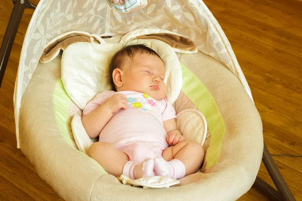 Baby girl newborn sleeping in the cradle — Stock Photo, Image