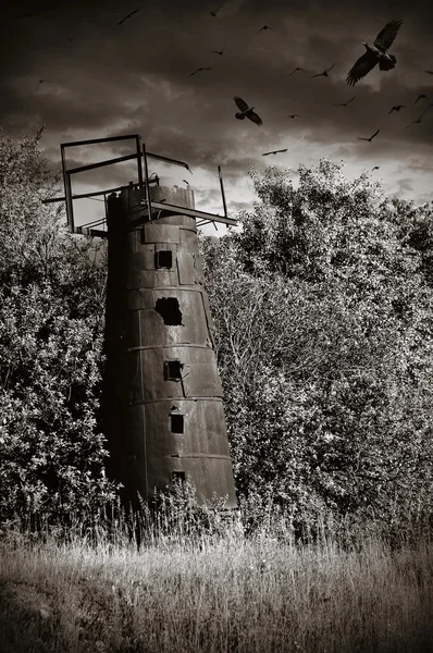 Mysticism rusty water tower monochrome — Stock Photo, Image