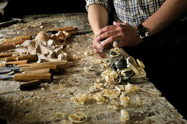 Hands of carver work with jointer in workshop — Stock Photo, Image