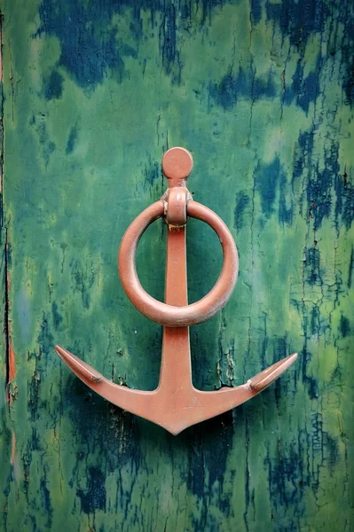 Old green  doors with copper anchor — Stock Photo, Image