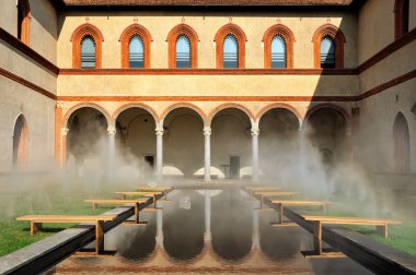 Middle Ages courtyard with pool in surreal fog clipart